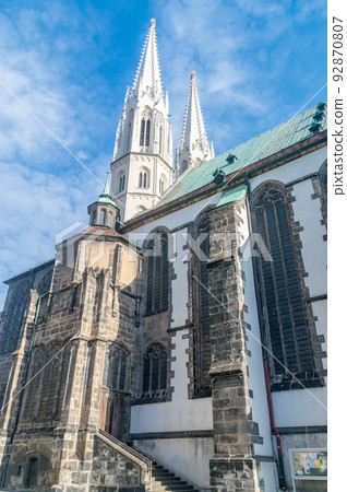 Towers of St. Peter and Pauls church in the old town of Gorlitz, Germany. Towers of St. Peter and Pauls church in the old town of Gorlitz, Germany. 92870807