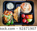 Thai food lunch boxs, Fried Rice and Seafood in take away plastic box. 92871907