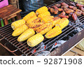 Grilled Thai sweet corn and Thai sweet potato. 92871908