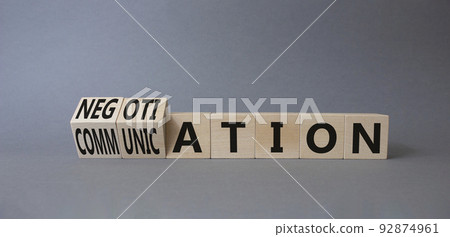 Negotiation vs Communication symbol. Turned cubes with words Negotiation and Communication. Beautiful grey background. Business concept. Copy space Negotiation vs Communication symbol. Turned cubes with words Negotiation and Communication. Beautiful grey background. Business concept. Copy space 92874961