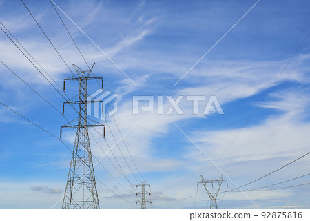 High voltage power transmission tower and sky background High voltage power transmission tower and sky background 92875816