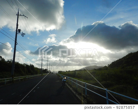 go out for a run on a bike early in the morning go out for a run on a bike early in the morning 92875857