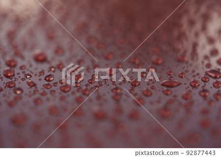 Water drops on a hydrophobic car paint surface 92877443