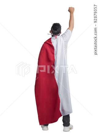 Rear view of Indonesian men celebrating Indonesian independence day on 17 August by wearing the Indonesian flag Rear view of Indonesian men celebrating Indonesian independence day on 17 August by wearing the Indonesian flag 92879357