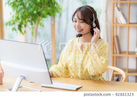 Young female operator working from home Young female operator working from home 92881323