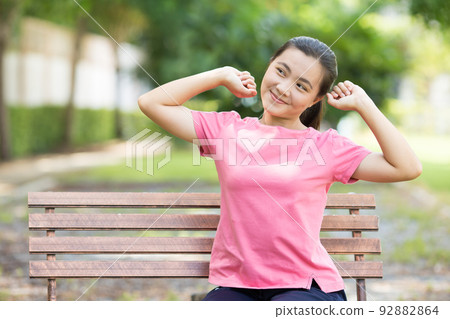 Woman with relax time at the garden Woman with relax time at the garden 92882864