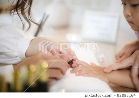 Girl doing nails Kids nail image 92883164