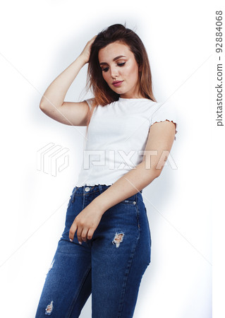 young pretty stylish blond girl posing emotional isolated on white background happy smiling cool smile, lifestyle people concept close up young pretty stylish blond girl posing emotional isolated on white background happy smiling cool smile, lifestyle people concept close up 92884068