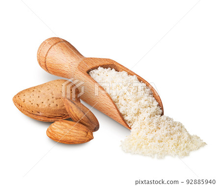 Wooden scoop full of almond flour isolated on white Wooden scoop full of almond flour isolated on white 92885940