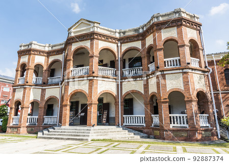 Building exterior of the Old Tainan Magistrate Residence in Taiwan. The residence is a two-story building with an English colonial architectural style. 92887374