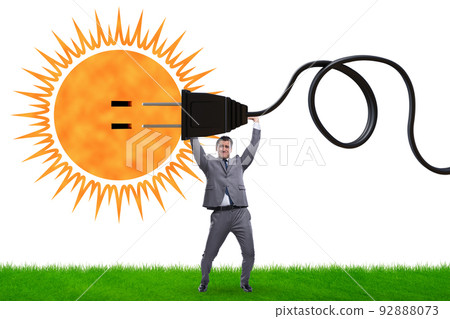 Businessman in solar energy concept Businessman in solar energy concept 92888073
