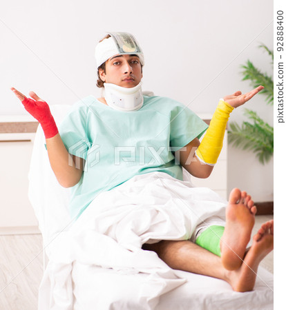 Young injured man staying in the hospital Young injured man staying in the hospital 92888400