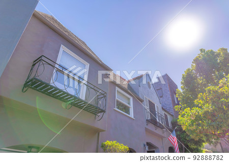 Sun glaring down directly at the houses in San Francisco, CA Sun glaring down directly at the houses in San Francisco, CA 92888782
