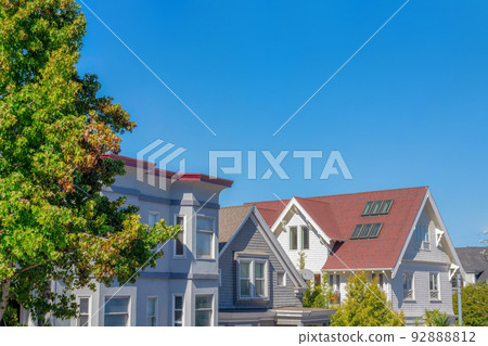 House peaks exterior against the blue sky in San Francisco, CA House peaks exterior against the blue sky in San Francisco, CA 92888812