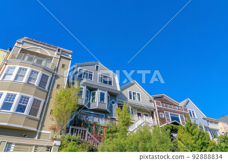 View of houses' exterior from below in San Francisco, CA View of houses' exterior from below in San Francisco, CA 92888834