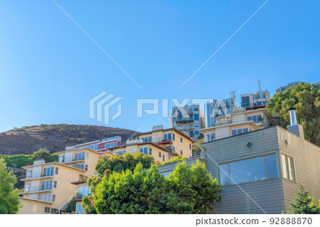 Apartment buildings on a slope of a mountain at San Francisco, California 92888870