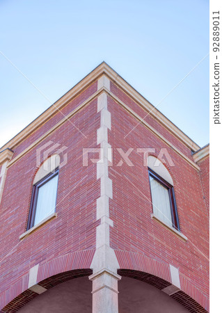Corner exterior of a building with bricks and quoin in San Francico, California Corner exterior of a building with bricks and quoin in San Francico, California 92889011