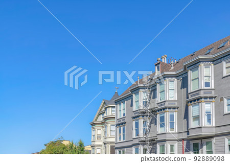 House and apartment buildings with queen anne style in San Francisco, CA 92889098