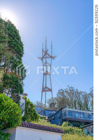 Sutro Tower over a neighborhood with large house buildings at San Francisco, California Sutro Tower over a neighborhood with large house buildings at San Francisco, California 92889226