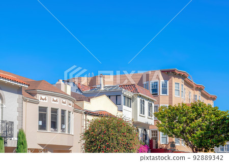 Row of mediterranean houses and apartment building at San Francisco, California Row of mediterranean houses and apartment building at San Francisco, California 92889342