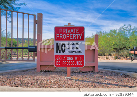 Private property signage on a post near the gate at Tucson, Arizona Private property signage on a post near the gate at Tucson, Arizona 92889344