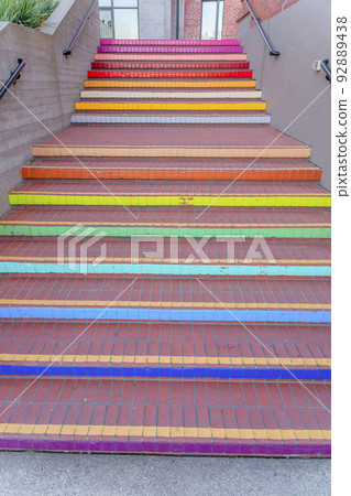 Staircase with bricks steps and painted risers near the Fisherman's Wharf in San Francisco, CA 92889438