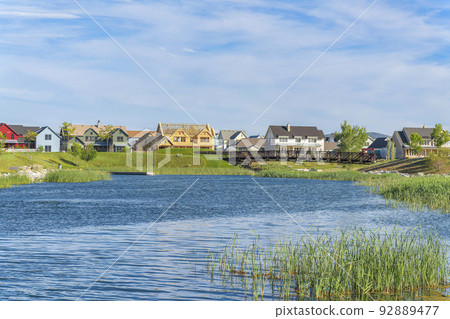 Reflective blue water of Oquirrh Lake at Daybreak, Utah Reflective blue water of Oquirrh Lake at Daybreak, Utah 92889477