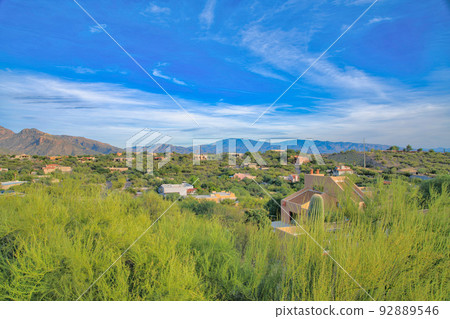 Suburban residential area on a sloped land at Tucson, Arizona Suburban residential area on a sloped land at Tucson, Arizona 92889546