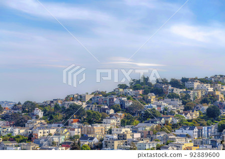 Rows of residential buildings with trees outdoors in San Francisco, California Rows of residential buildings with trees outdoors in San Francisco, California 92889600