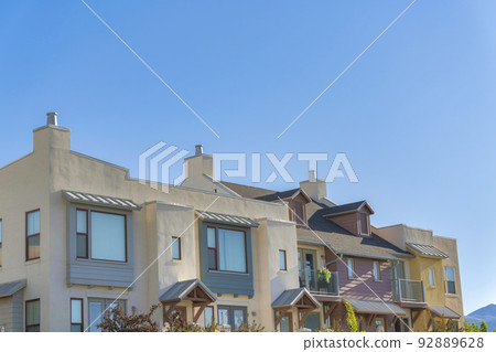 Complex apartment buildings with colorful exterior at Daybreak in South Jordan, Utah Complex apartment buildings with colorful exterior at Daybreak in South Jordan, Utah 92889628