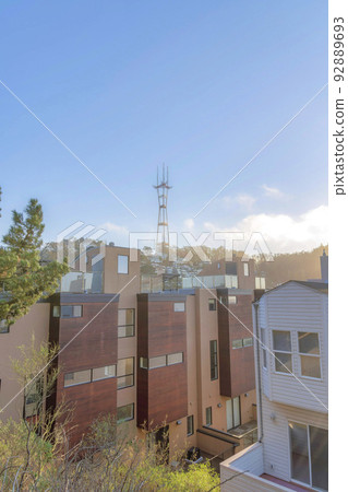 View of townhouses against the Sutro Tower at the back in San Francisco, CA 92889693