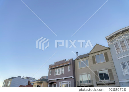 Low angle slanted view of suburban houses in San Francisco, California 92889728