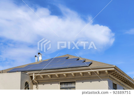 Roof of a house with victorian trims and solar panels on its roof in San Francisco, California Roof of a house with victorian trims and solar panels on its roof in San Francisco, California 92889751