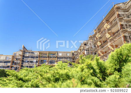 Unfinished construction of a large complex apartment buildings in San Francisco, CA 92889922