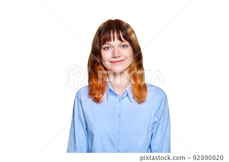 Smiling redhead teenage female on white isolated background 92890820