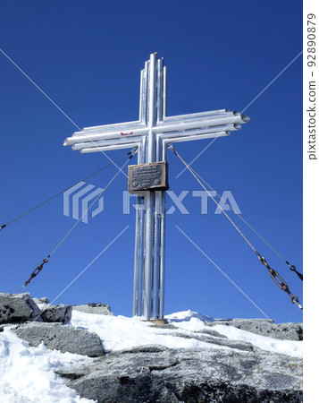 Summit cross Stubacher Sonnblick mountain, alpine ski tour, Tyrol, Austria 92890879