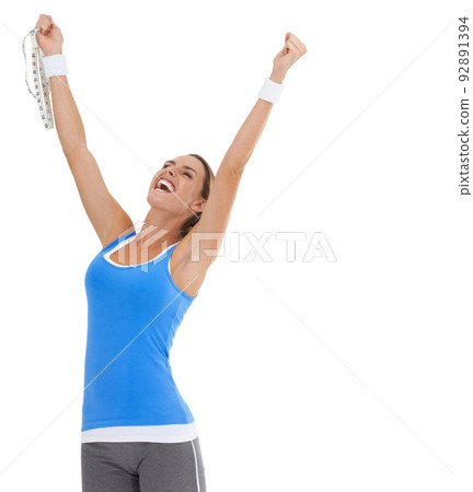 Thrilled with her fitness achievements. Healthy young woman expressing triumph while holding a tape measure and isolated on white. Thrilled with her fitness achievements. Healthy young woman expressing triumph while holding a tape measure and isolated on white. 92891394