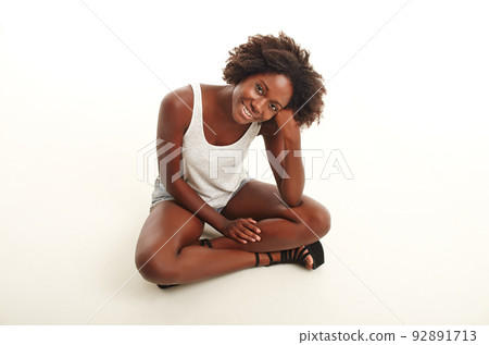 Positive expressions. A young woman against a white background. 92891713
