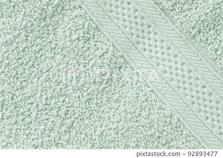 Mint green bath sheet or towels texture pattern background. Bathroom body hygiene or spa concept. Close up, copy space 92893477