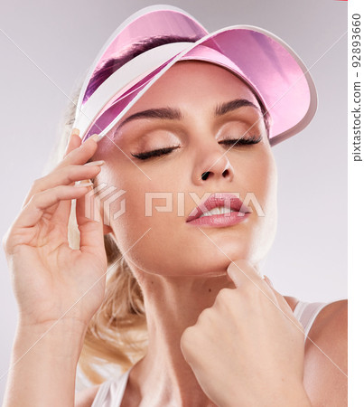 A beautiful woman is the one who never compares herself. Studio shot of a sporty young woman posing against a grey background. 92893660