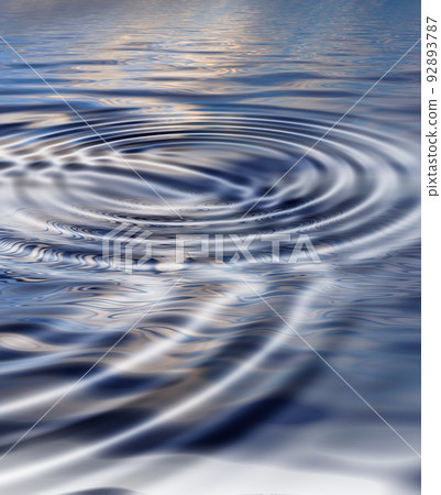 Zoom in on a ripple effect and pattern on a water surface. Creative puddle with abstract circle rings, calm, peaceful and tranquil meditative theme with copyspace. Cool nature wallpaper or background 92893787