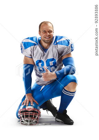 Sports emotions. Standing on one knee on a white background. Joy in football. Human emotions and facial expressions concept. Sport victory. Isolated 92893886