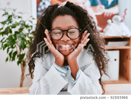 Why didnt anyone tell me science is so much fun. Portrait of an adorable young school girl feeling cheerful in science class at school. Why didnt anyone tell me science is so much fun. Portrait of an adorable young school girl feeling cheerful in science class at school. 92893966