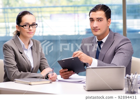 Businesspeople having discussion in the office Businesspeople having discussion in the office 92894431