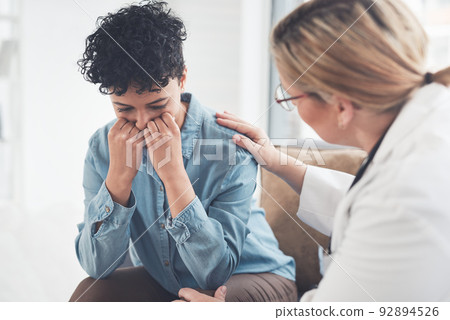 Everything will be fine if you just take your treatment.... Cropped shot of a compassionate young female doctor consoling a female patient in her office. Everything will be fine if you just take your treatment.... Cropped shot of a compassionate young female doctor consoling a female patient in her office. 92894526