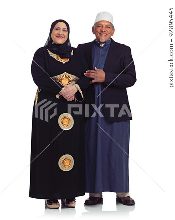 Weve shared a lifetime of happiness. Studio portrait of a smiling senior muslim couple isolated on white. Weve shared a lifetime of happiness. Studio portrait of a smiling senior muslim couple isolated on white. 92895445