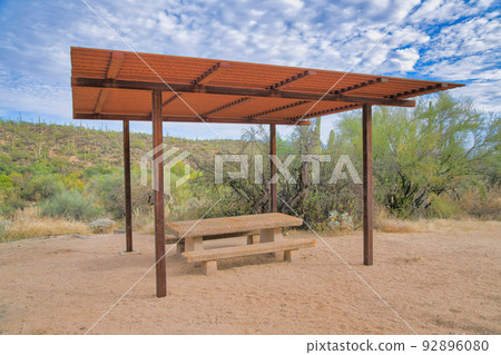 Campground with picnic table under a roof at Sabino Canyon State Park in Tucson, Arizona Campground with picnic table under a roof at Sabino Canyon State Park in Tucson, Arizona 92896080