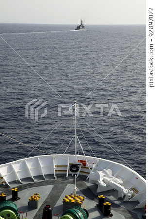 An escort vessel for a cruise ship sailing in the Gulf of Aden off the coast of Somalia An escort vessel for a cruise ship sailing in the Gulf of Aden off the coast of Somalia 92897022