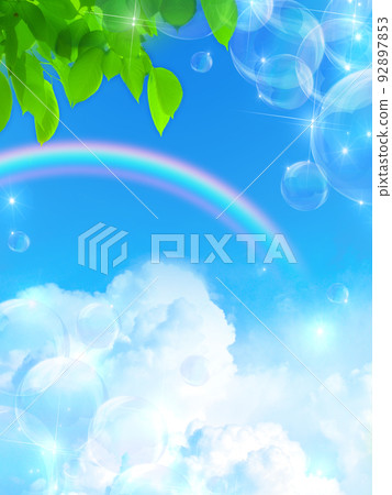 Soap bubbles floating in fresh green and blue sky 92897853