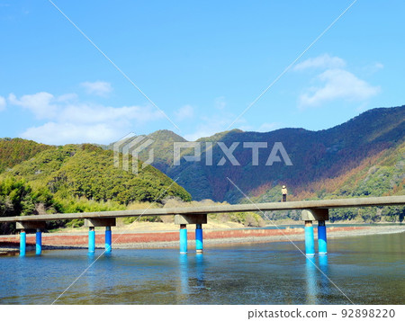 Sada subsidence bridge over Shimanto river and tourists Sada subsidence bridge over Shimanto river and tourists 92898220